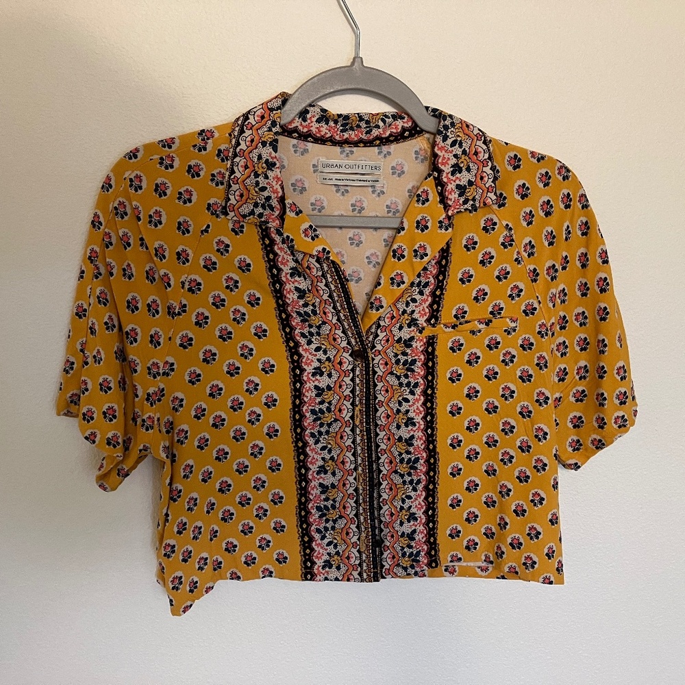 Urban Outfitters mustard yellow patterned crop top.